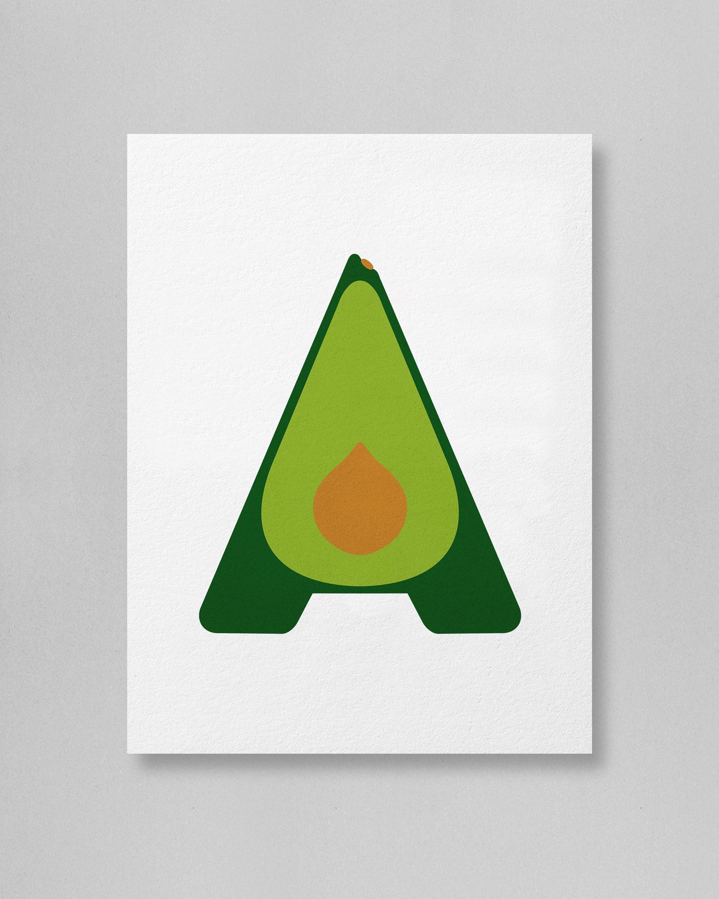 Avocado-shaped letter 'A' with a green body and brown pit on a white background
