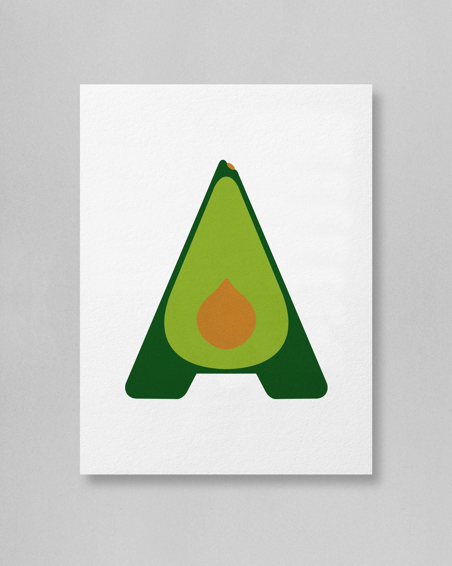 Avocado-shaped letter 'A' with a green body and brown pit on a white background